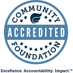 Community Foundation Accredited logo, blue and circular.